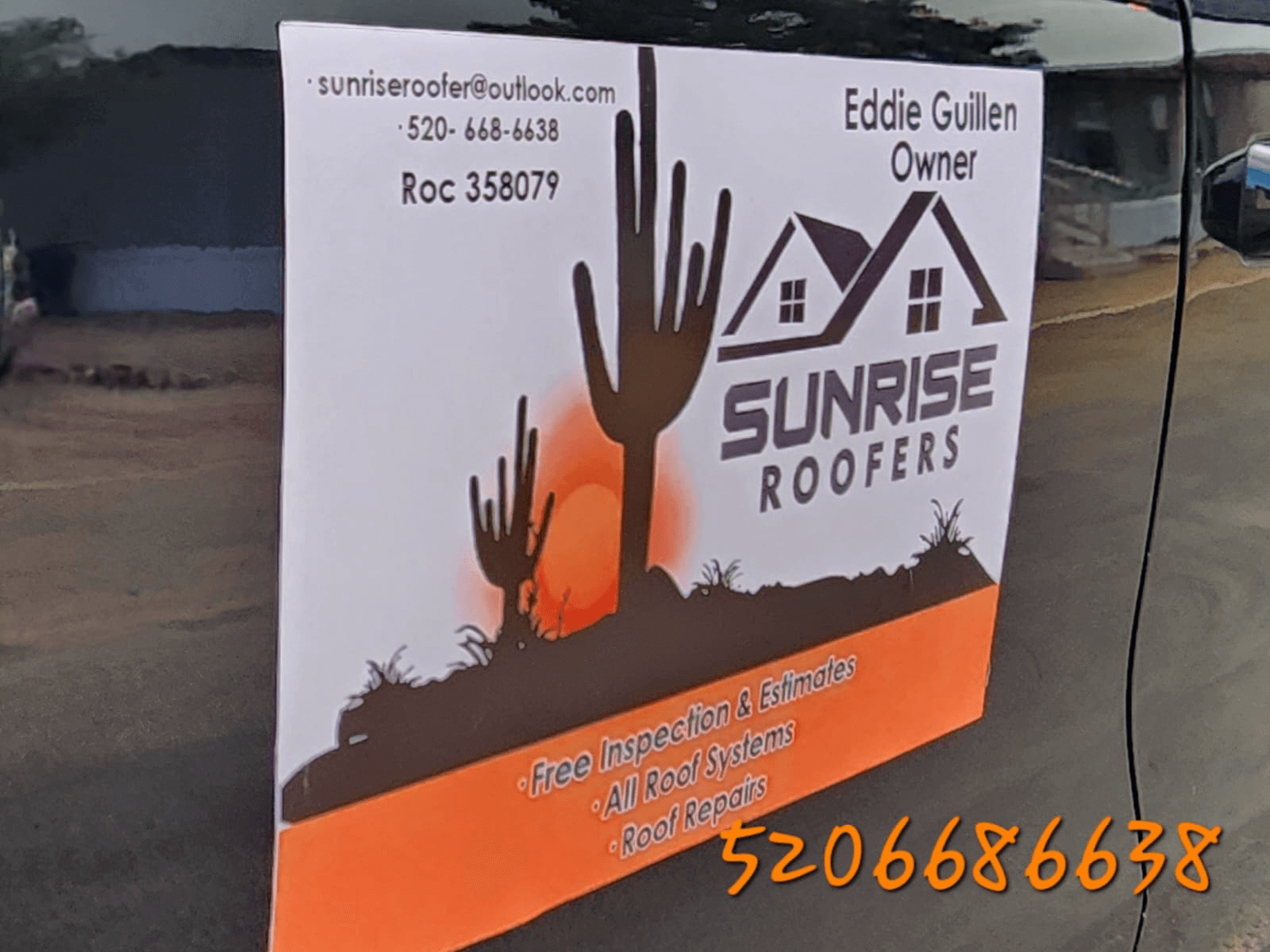 Sunrise Roofers truck at job site