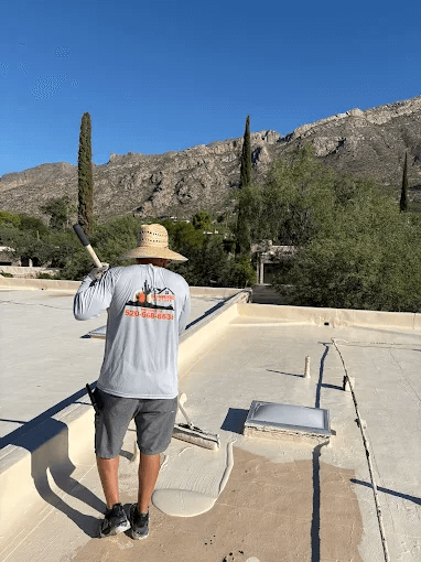 Sunrise Roofers team working on flat roof in Tucson